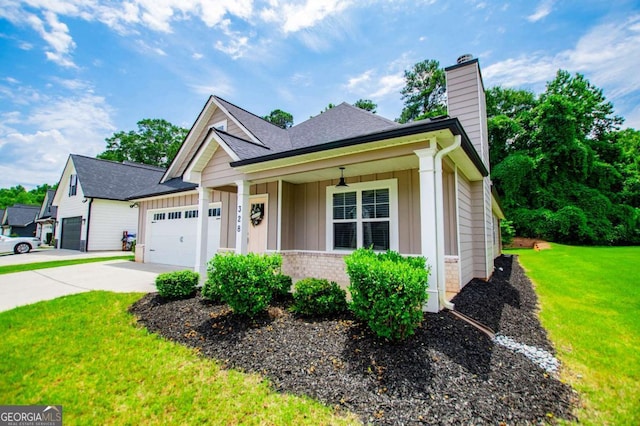 328 Brookstone Dr, Carrollton, GA 30116 - single story home featuring a chimney, an attached garage, a front lawn, board and batten siding, and driveway