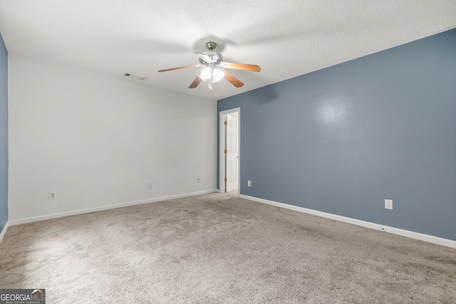 4753 Klondike Cv, Lithonia, GA 30038 - empty room with ceiling fan, carpet flooring, and a textured ceiling