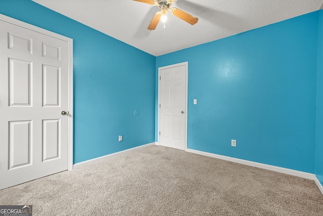 4753 Klondike Cv, Lithonia, GA 30038 - unfurnished bedroom with carpet and ceiling fan