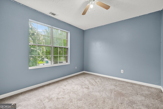 4753 Klondike Cv, Lithonia, GA 30038 - carpeted spare room with a textured ceiling and a ceiling fan