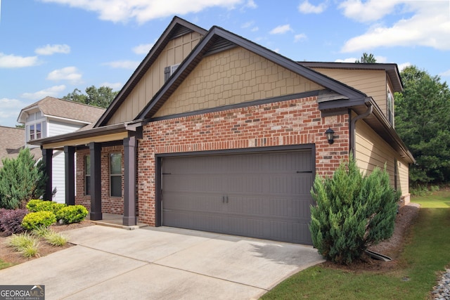 115 Court Xing, Locust Grove, GA 30248 - view of side of property with driveway, an attached garage, and brick siding