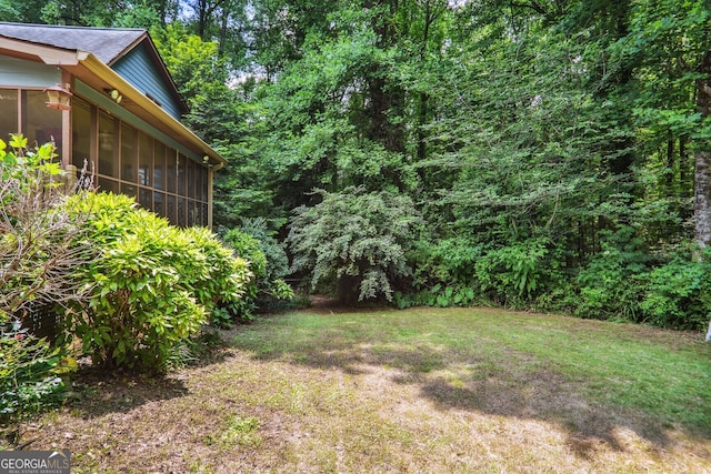 9055 Green Valley Ct, Douglasville, GA 30134 - view of grassy yard featuring a sunroom
