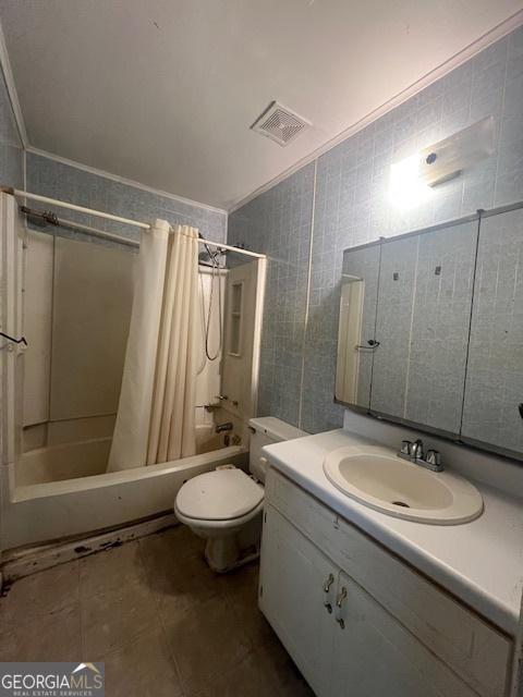1041 Sandy Ridge Rd, Mcdonough, GA 30252 - bathroom with shower / bath combo, vanity, crown molding, and tile patterned flooring