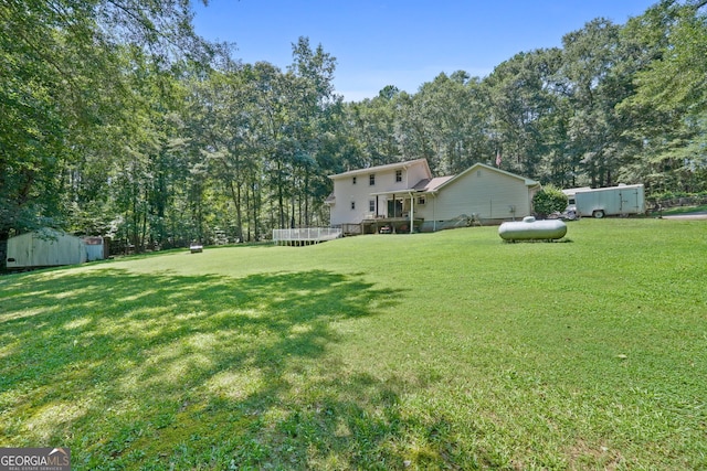292 Selfridge Rd, Mcdonough, GA 30252 - view of grassy yard with a storage shed