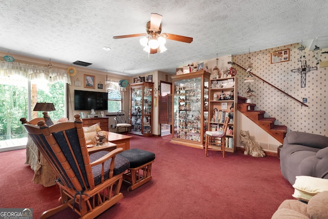 292 Selfridge Rd, Mcdonough, GA 30252 - living room featuring carpet, ceiling fan, a textured ceiling, and stairway