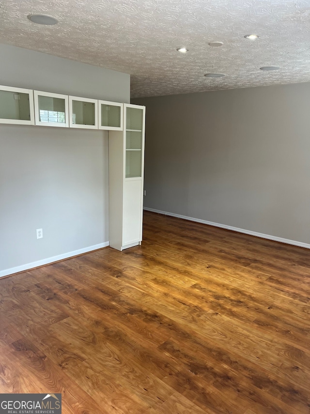 470 Huntington Rd Unit 5, Athens, GA 30606 - unfurnished room with dark wood finished floors and baseboards