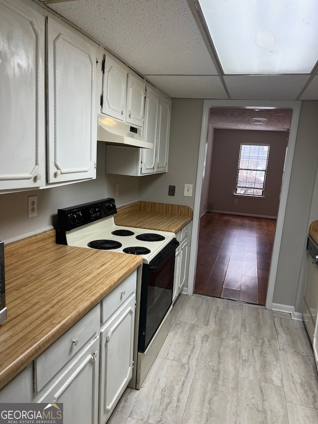 470 Huntington Rd Unit 5, Athens, GA 30606 - kitchen with electric range oven, under cabinet range hood, light wood-type flooring, light countertops, and white cabinetry