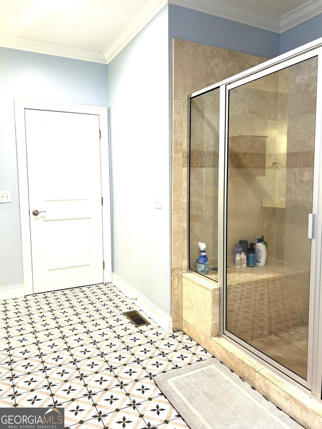 327 Highland Pointe Dr, Cohutta, GA 30710 - full bath featuring a shower stall, ornamental molding, and tile patterned floors