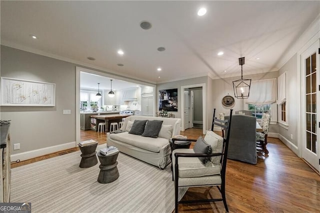 510 Heards Ferry Rd, Atlanta, GA 30328 - living area featuring ornamental molding, recessed lighting, and wood finished floors