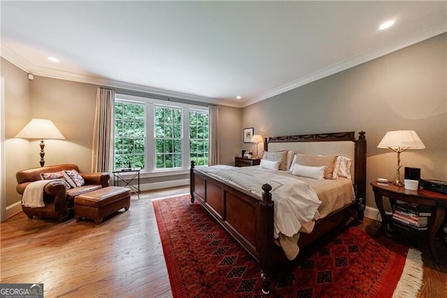 510 Heards Ferry Rd, Atlanta, GA 30328 - bedroom featuring crown molding, wood finished floors, and recessed lighting