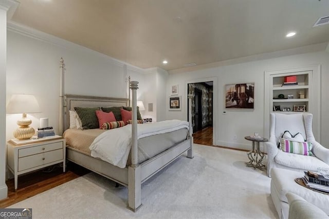 510 Heards Ferry Rd, Atlanta, GA 30328 - bedroom featuring wood finished floors, ornamental molding, recessed lighting, and a spacious closet