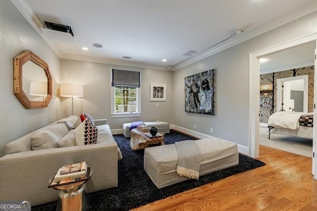 510 Heards Ferry Rd, Atlanta, GA 30328 - living room featuring ornamental molding, wood finished floors, and recessed lighting