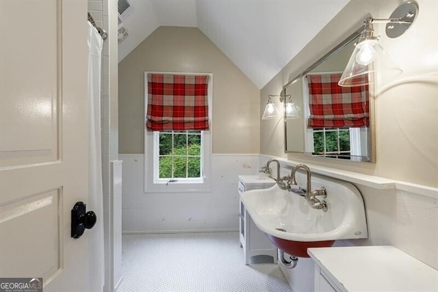 510 Heards Ferry Rd, Atlanta, GA 30328 - full bath featuring vaulted ceiling and a wainscoted wall