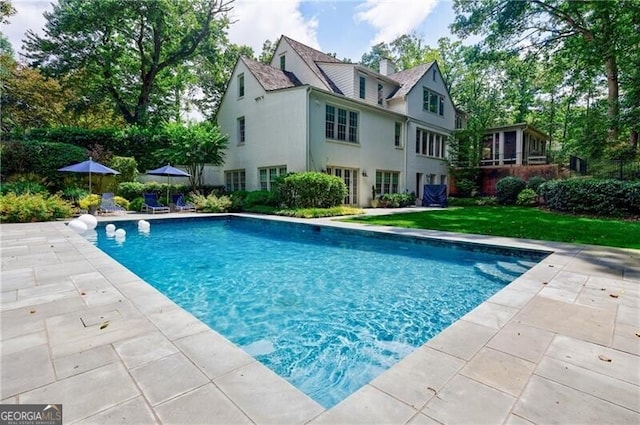 510 Heards Ferry Rd, Atlanta, GA 30328 - swimming pool featuring a patio and a yard