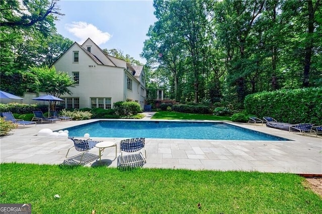 510 Heards Ferry Rd, Atlanta, GA 30328 - swimming pool featuring a patio and a lawn
