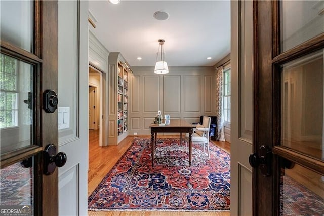 510 Heards Ferry Rd, Atlanta, GA 30328 - office area with a decorative wall, wood finished floors, and recessed lighting