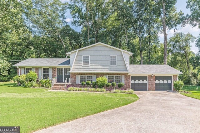 3109 Albatross Ln, Decatur, GA 30034 - tri-level home with asphalt driveway, brick siding, a garage, and a front yard