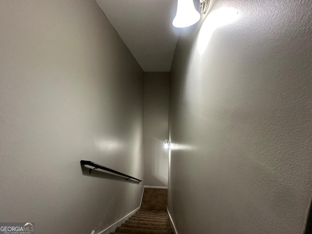 1017 Wheel House Ln Unit D, Monroe, GA 30655 - staircase featuring baseboards and carpet
