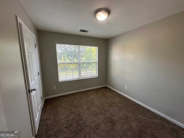 1017 Wheel House Ln Unit D, Monroe, GA 30655 - spare room with baseboards and carpet