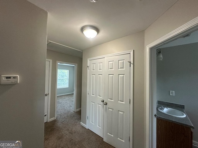 1017 Wheel House Ln Unit D, Monroe, GA 30655 - corridor with a sink and dark colored carpet