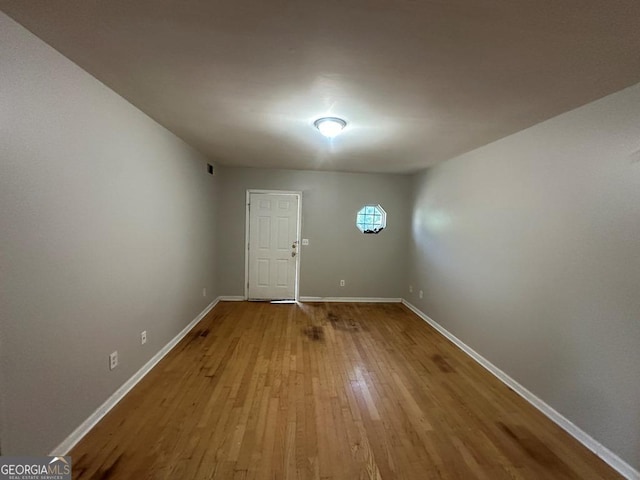 1017 Wheel House Ln Unit D, Monroe, GA 30655 - foyer entrance featuring hardwood / wood-style floors and baseboards