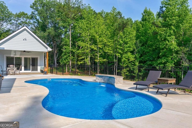 1111 Mcleods Estates Dr, Monroe, GA 30655 - view of swimming pool featuring a patio, a jacuzzi, and a ceiling fan