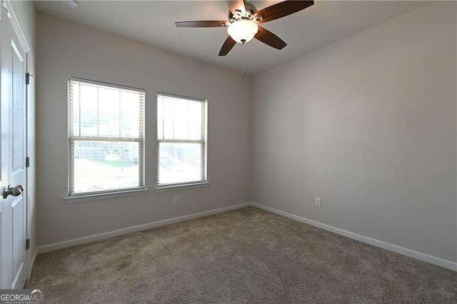 1057 Towne Mill Xing, Canton, GA 30114 - carpeted empty room featuring a ceiling fan and baseboards