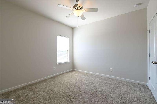 1057 Towne Mill Xing, Canton, GA 30114 - carpeted empty room with a ceiling fan and baseboards