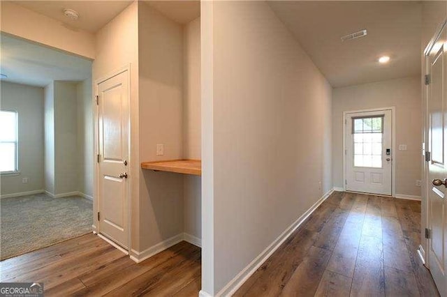 1057 Towne Mill Xing, Canton, GA 30114 - hallway featuring wood-type flooring and baseboards