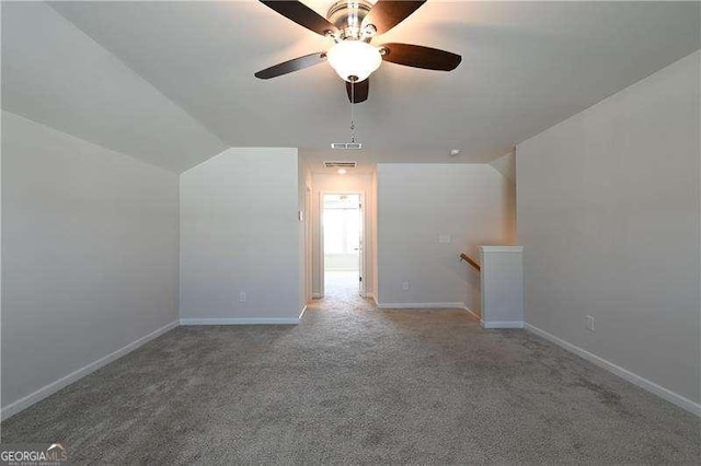 1057 Towne Mill Xing, Canton, GA 30114 - additional living space featuring carpet flooring, a ceiling fan, and vaulted ceiling