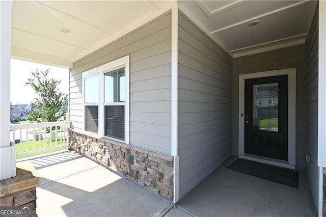 1057 Towne Mill Xing, Canton, GA 30114 - entrance to property with a porch and stone siding