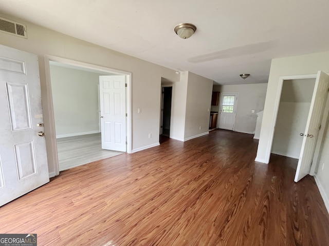 1042 Wheel House Ln Unit C, Monroe, GA 30655 - unfurnished room featuring wood finished floors and baseboards