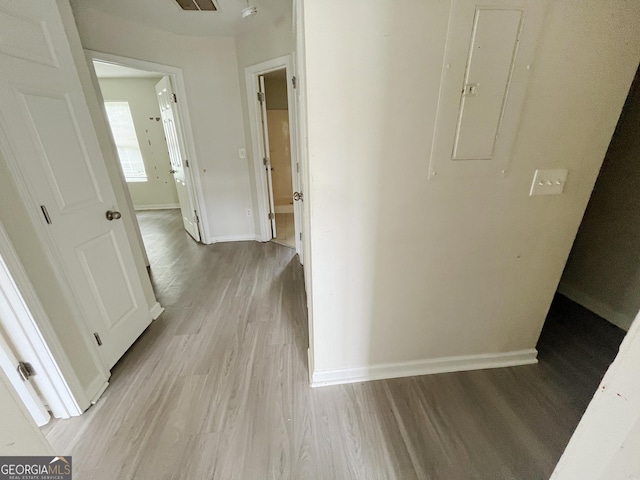 1042 Wheel House Ln Unit C, Monroe, GA 30655 - corridor featuring electric panel and light wood finished floors