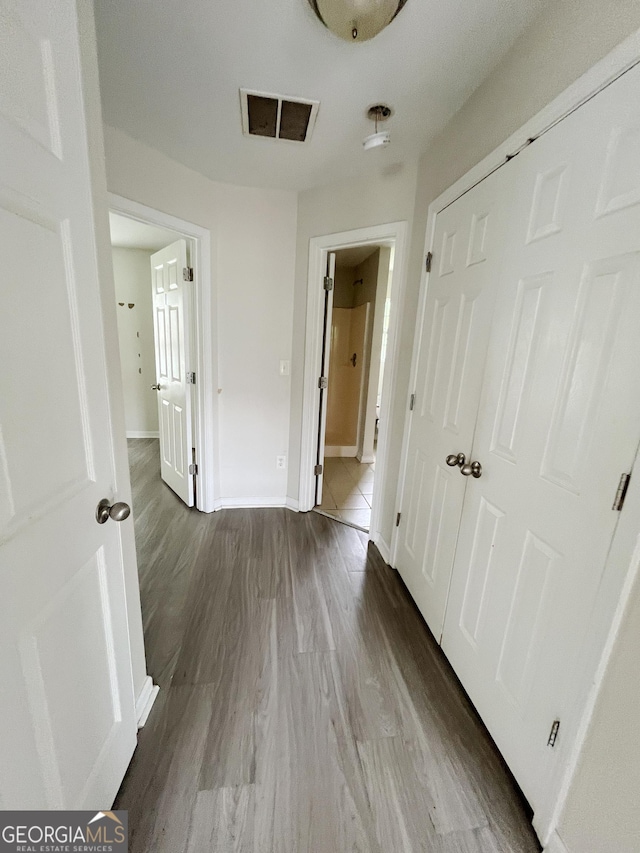 1042 Wheel House Ln Unit C, Monroe, GA 30655 - hallway with dark wood-style floors