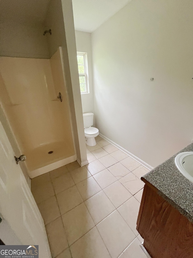 1042 Wheel House Ln Unit C, Monroe, GA 30655 - full bathroom featuring vanity, tile patterned flooring, and a shower