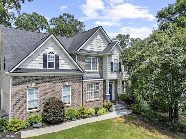 302 Thornhill Cir, Jefferson, GA 30549 - craftsman-style house featuring brick siding and roof with shingles