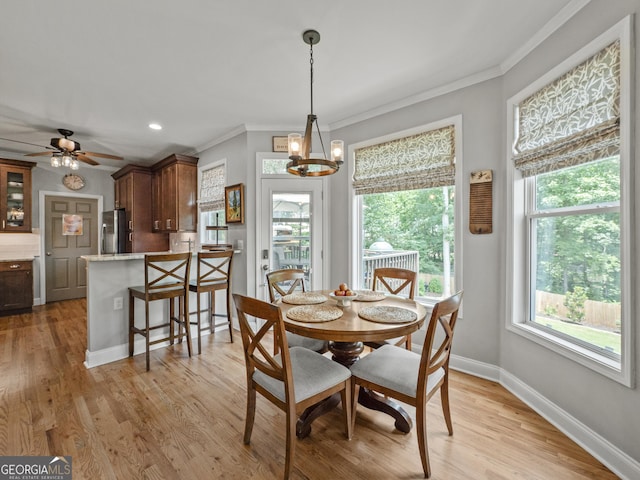 302 Thornhill Cir, Jefferson, GA 30549 - dining room with a chandelier, crown molding, light wood finished floors, recessed lighting, and a ceiling fan