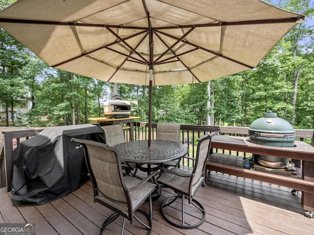 302 Thornhill Cir, Jefferson, GA 30549 - wooden terrace with outdoor dining area, grilling area, and view of scattered trees