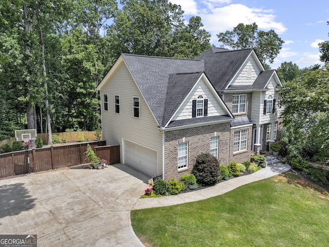 302 Thornhill Cir, Jefferson, GA 30549 - traditional-style house with a garage, driveway, roof with shingles, and brick siding