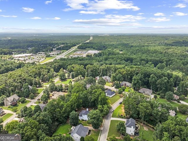 302 Thornhill Cir, Jefferson, GA 30549 - aerial perspective of suburban area with a heavily wooded area