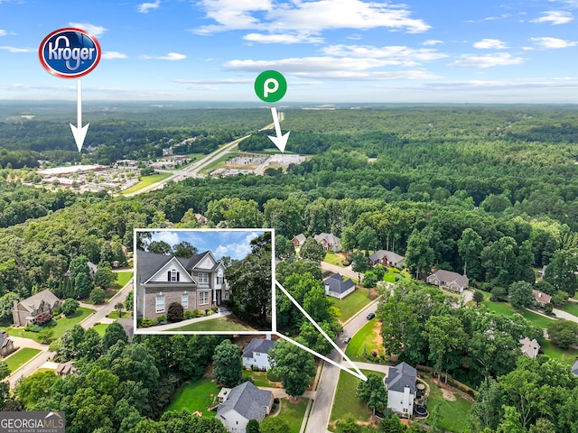 302 Thornhill Cir, Jefferson, GA 30549 - aerial view of property and surrounding area with a forest and property boundaries highlighted
