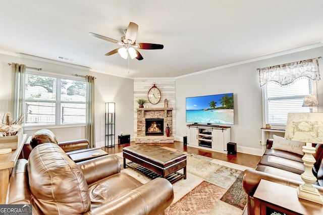 2325 Lake Cove Ct, Buford, GA 30519 - living area featuring ceiling fan, ornamental molding, a fireplace, and wood finished floors