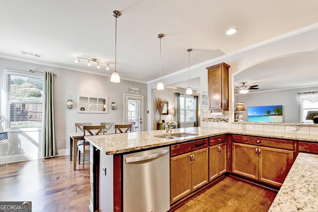 2325 Lake Cove Ct, Buford, GA 30519 - kitchen with dishwasher, pendant lighting, crown molding, healthy amount of natural light, and dark wood-style flooring