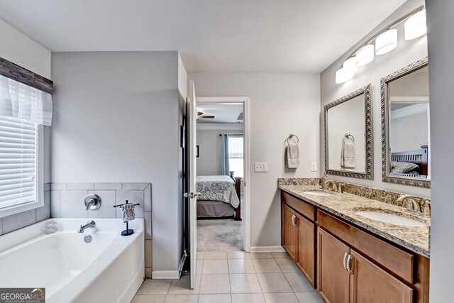 2325 Lake Cove Ct, Buford, GA 30519 - ensuite bathroom featuring double vanity, tile patterned flooring, and a bath