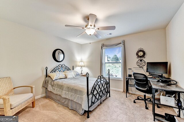 2325 Lake Cove Ct, Buford, GA 30519 - bedroom with light carpet, a desk, and a ceiling fan