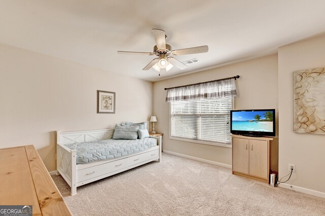 2325 Lake Cove Ct, Buford, GA 30519 - bedroom with light carpet and a ceiling fan