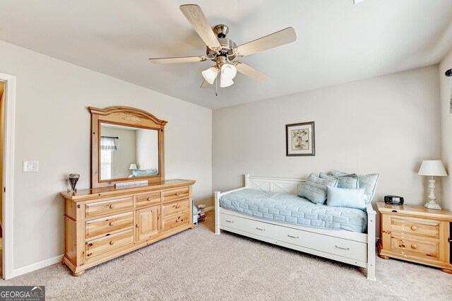 2325 Lake Cove Ct, Buford, GA 30519 - bedroom with light colored carpet and a ceiling fan