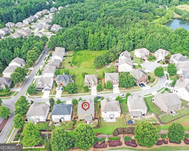 2325 Lake Cove Ct, Buford, GA 30519 - aerial overview of property's location featuring nearby suburban area and a forest