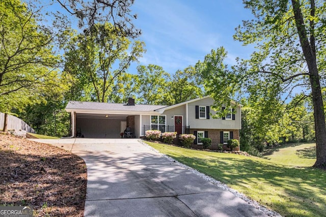 15 Cedar Ln E, Newnan, GA 30263 - tri-level home with driveway, brick siding, a chimney, and an attached carport
