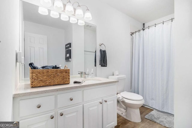 15 Cedar Ln E, Newnan, GA 30263 - full bathroom featuring vanity, wood finished floors, and a shower with shower curtain